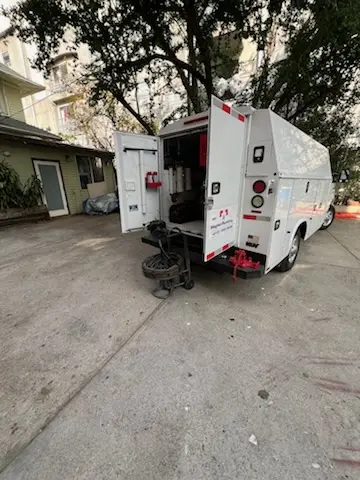 Magnet Plumbing service vehicle on-site for Grease Trap Cleaning in Hollywood Hills West